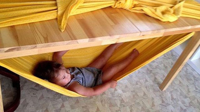 Make A Child Friendly Hammock With A Bed Sheet And A Table