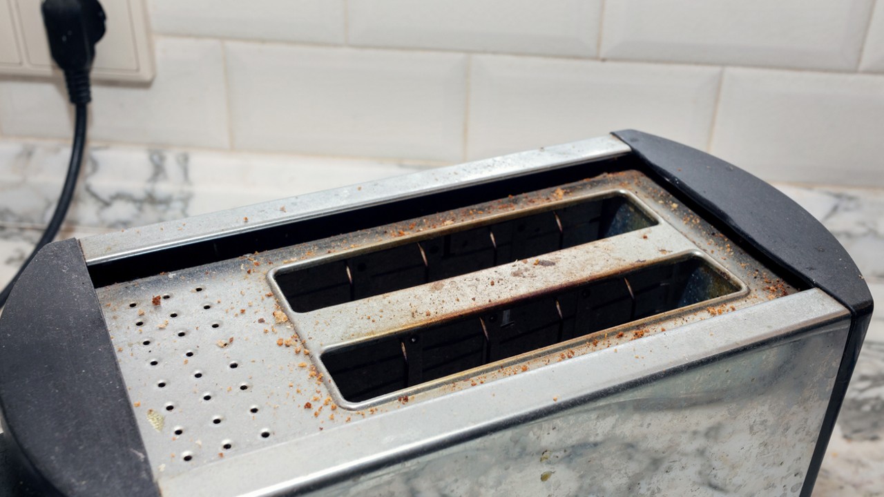 When Cleaning A Toaster Oven, Don't Just Dump The Crumb Tray